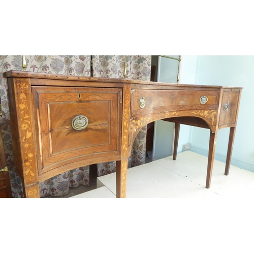 82 - A late 18th/early 19thC hardwood and marquetry, concave front sideboard, fitted with three drawers a... 