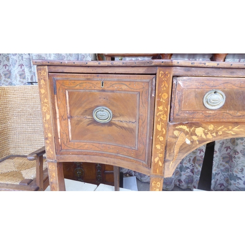 82 - A late 18th/early 19thC hardwood and marquetry, concave front sideboard, fitted with three drawers a... 