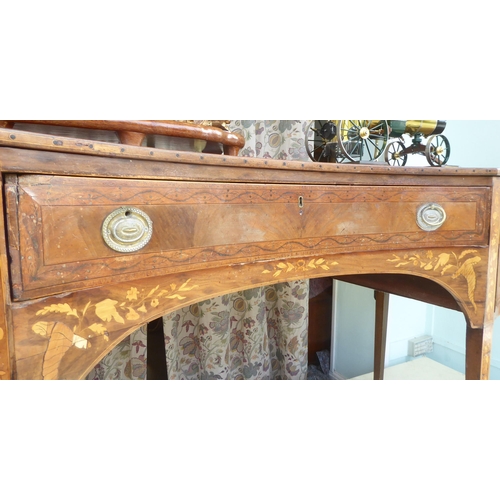 82 - A late 18th/early 19thC hardwood and marquetry, concave front sideboard, fitted with three drawers a... 