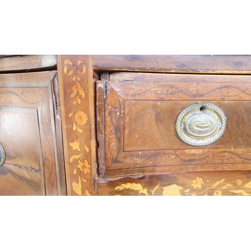 82 - A late 18th/early 19thC hardwood and marquetry, concave front sideboard, fitted with three drawers a... 