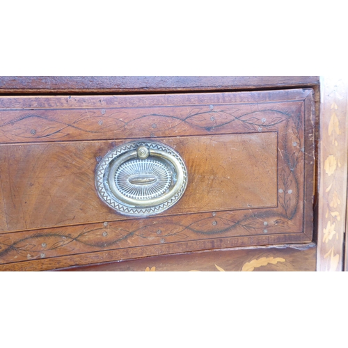 82 - A late 18th/early 19thC hardwood and marquetry, concave front sideboard, fitted with three drawers a... 