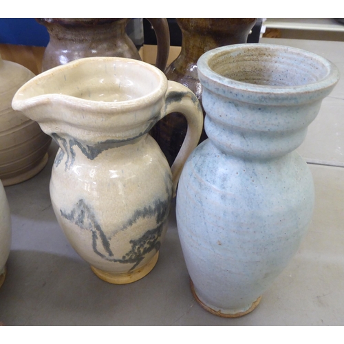 115 - Studio pottery: to include vases and jugs  various sizes, colours and designs