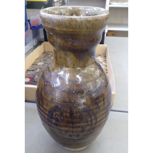 115 - Studio pottery: to include vases and jugs  various sizes, colours and designs