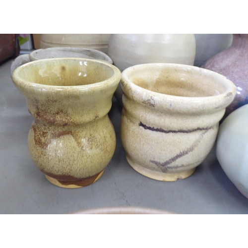 115 - Studio pottery: to include vases and jugs  various sizes, colours and designs