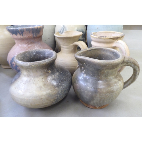 115 - Studio pottery: to include vases and jugs  various sizes, colours and designs