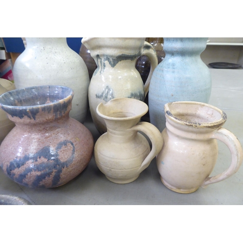 115 - Studio pottery: to include vases and jugs  various sizes, colours and designs