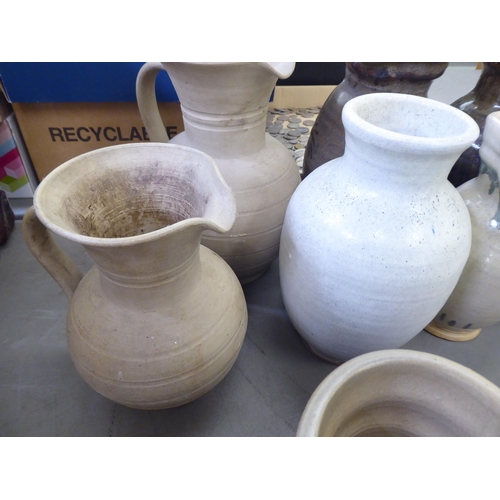 115 - Studio pottery: to include vases and jugs  various sizes, colours and designs