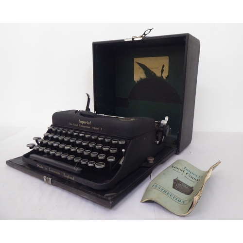 120 - A vintage Imperial Model T portable manual typewriter