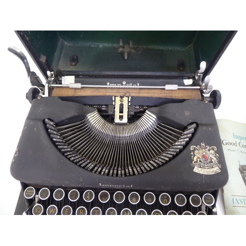 120 - A vintage Imperial Model T portable manual typewriter