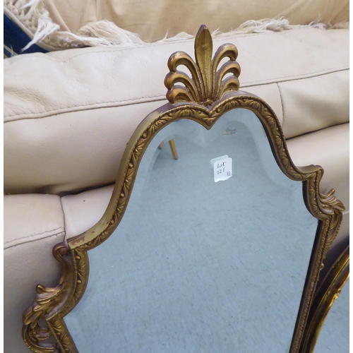 121 - Two dissimilar bevelled glass mirrors, in gilt frames  21