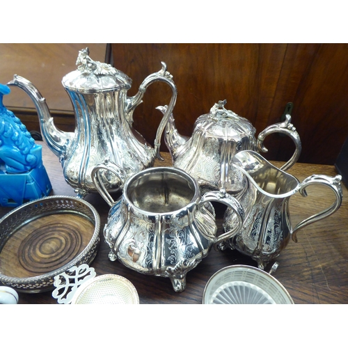 131 - A mixed lot: to include a four piece silver plated tea set, decorated in Victorian taste 