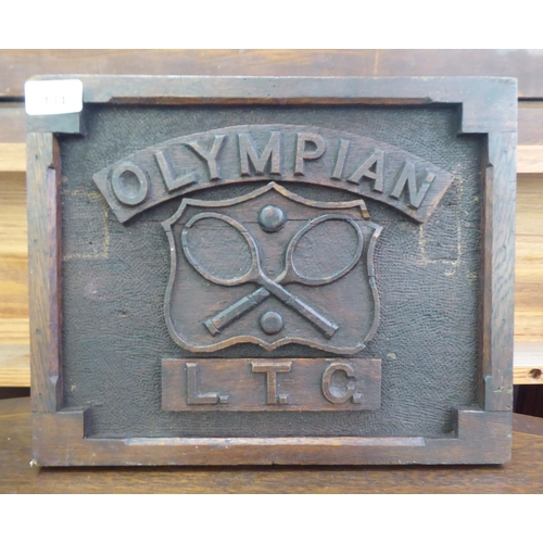 134 - An early 20thC Olympian LTC tennis trophy plaque, carved in relief, in a frame  10.5