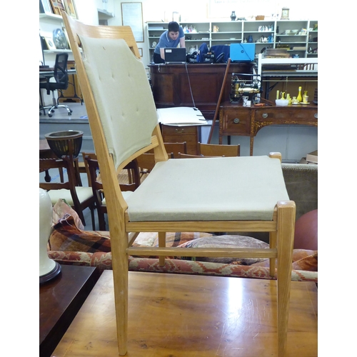 148 - A set of ten modern designer light oak framed dining chairs chairs with square backs, part button up... 