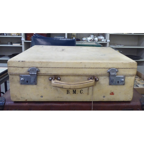 152 - Four items of 20thC luggage: to include a brown hide doctor's style bag 