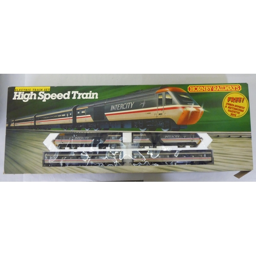 160 - A collection of 00 gauge model locomotives, carriages, tenders and track accessories; and other exam... 