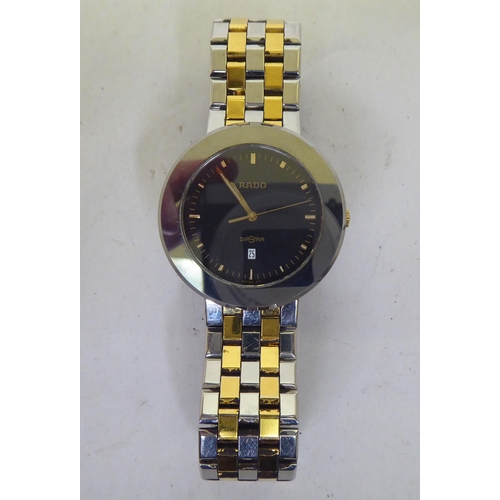 169 - A Rado Diastar gold plated and stainless steel cased and strapped wristwatch, faced by a baton dial ... 