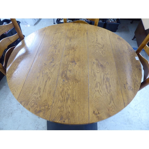 18 - A modern oak table, raised on block legs  30