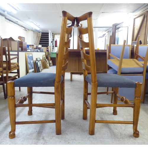 18 - A modern oak table, raised on block legs  30