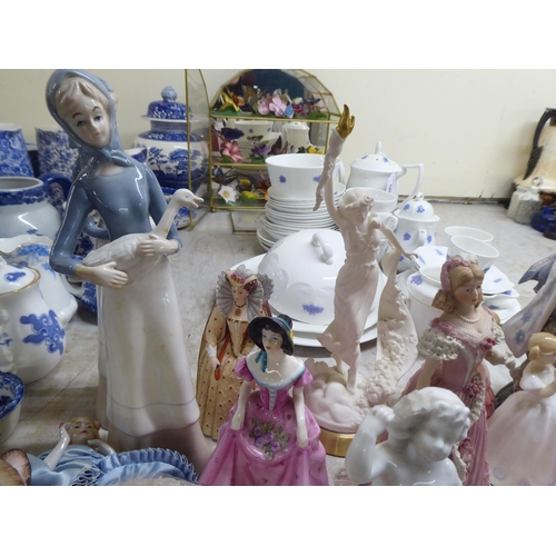 184 - Decorative ceramic figures: to include a Lladro porcelain geisha  9