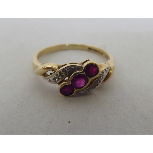 186 - A 9ct gold, ruby and diamond ring