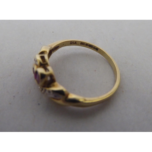 186 - A 9ct gold, ruby and diamond ring