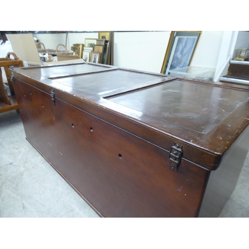 195 - A mid 20thC brown painted beech chest with straight sides and a hinged lid  17