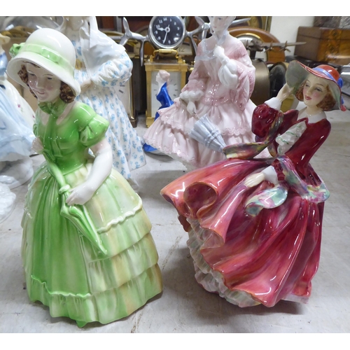 197 - Decorative ceramic figures: to include a Royal Worcester bone china example 'Safe at Last'  Limited ... 