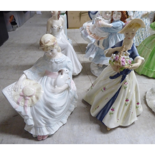 197 - Decorative ceramic figures: to include a Royal Worcester bone china example 'Safe at Last'  Limited ... 