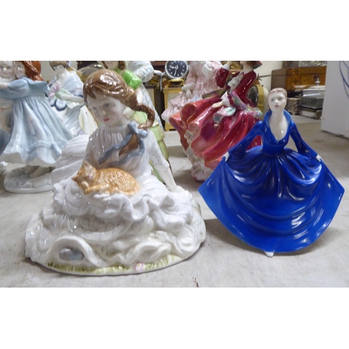 197 - Decorative ceramic figures: to include a Royal Worcester bone china example 'Safe at Last'  Limited ... 