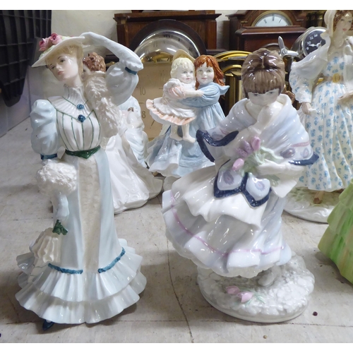 197 - Decorative ceramic figures: to include a Royal Worcester bone china example 'Safe at Last'  Limited ... 