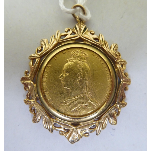 203 - A Victorian sovereign, St George on the obverse  1888, in a 9ct gold mount