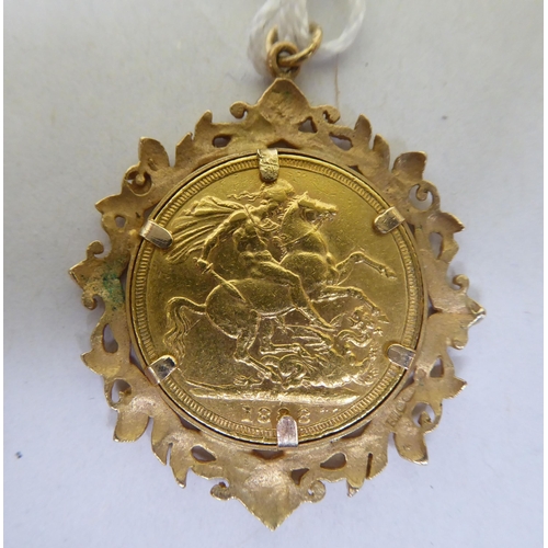 203 - A Victorian sovereign, St George on the obverse  1888, in a 9ct gold mount