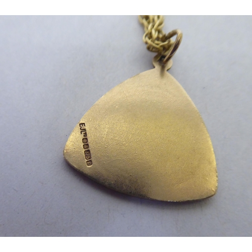 204 - A 9ct gold triangular pendant, on a fine neckchain