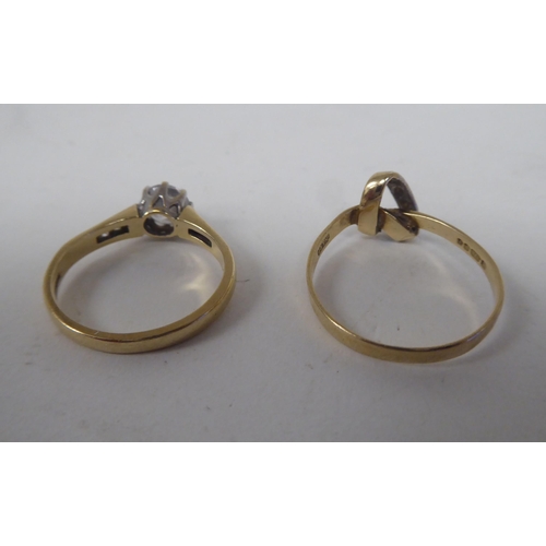 206 - Six white and gold rings, set with various stones