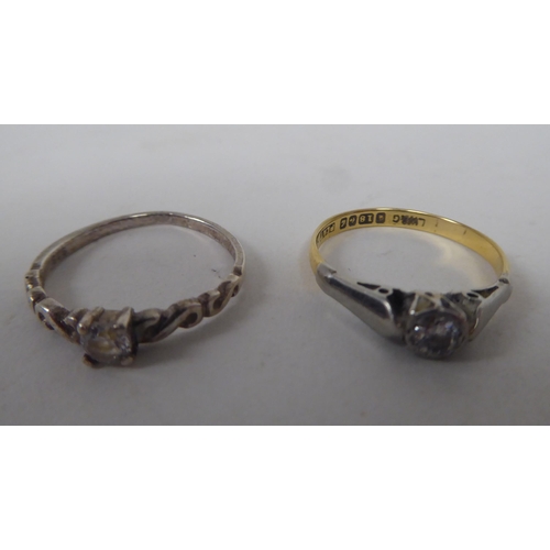 206 - Six white and gold rings, set with various stones