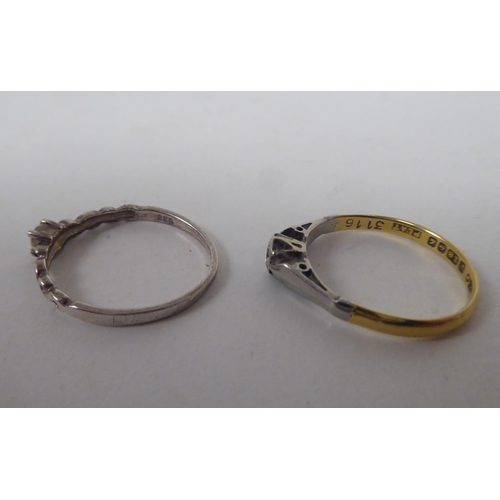 206 - Six white and gold rings, set with various stones