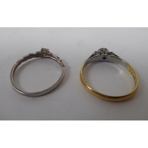 206 - Six white and gold rings, set with various stones