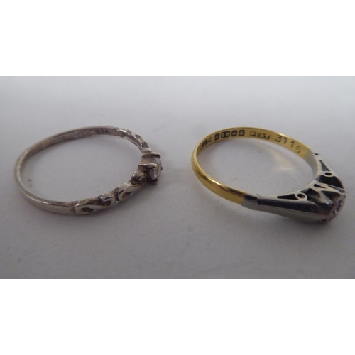 206 - Six white and gold rings, set with various stones