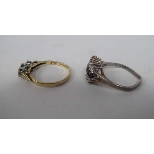 206 - Six white and gold rings, set with various stones