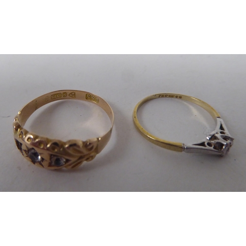 207 - Six white and gold rings, set with various stones