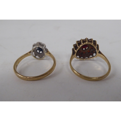 207 - Six white and gold rings, set with various stones