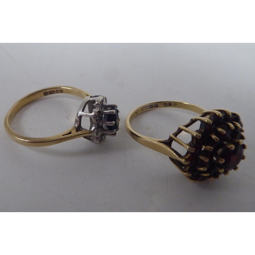 207 - Six white and gold rings, set with various stones