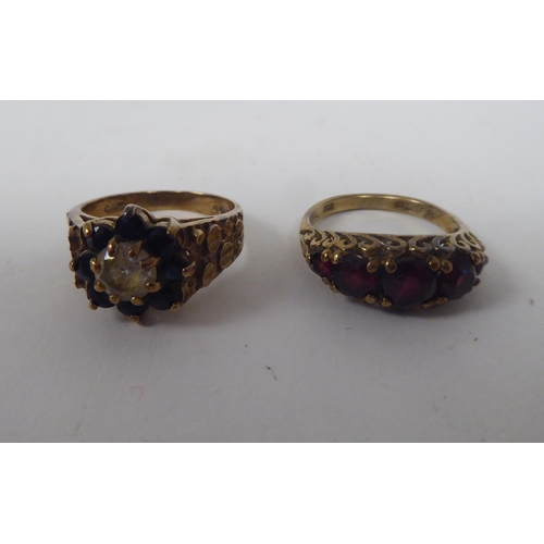 207 - Six white and gold rings, set with various stones