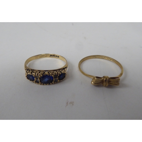 208 - Six white and gold rings, set with various stones