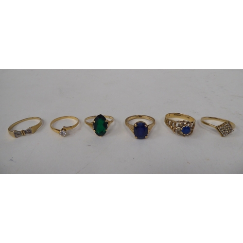 211 - Six white and gold rings, set with various stones