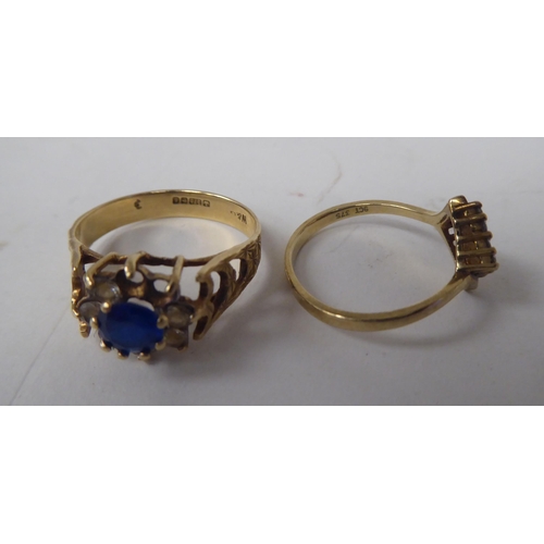 211 - Six white and gold rings, set with various stones