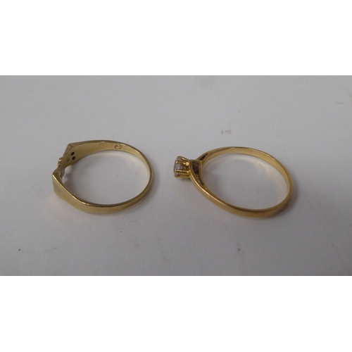 211 - Six white and gold rings, set with various stones