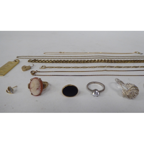 212 - Items of personal ornament: to include yellow metal chains; and a 9ct gold cameo ring