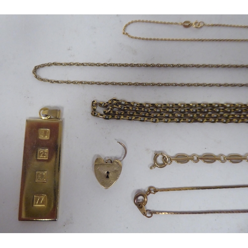 212 - Items of personal ornament: to include yellow metal chains; and a 9ct gold cameo ring