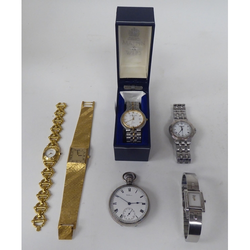 213 - Five variously cased and strapped wristwatches: to include examples by Raymond Weil and Gucci; and a... 